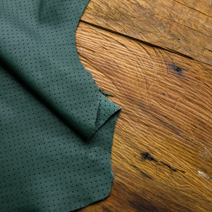 Perforated dark green skin