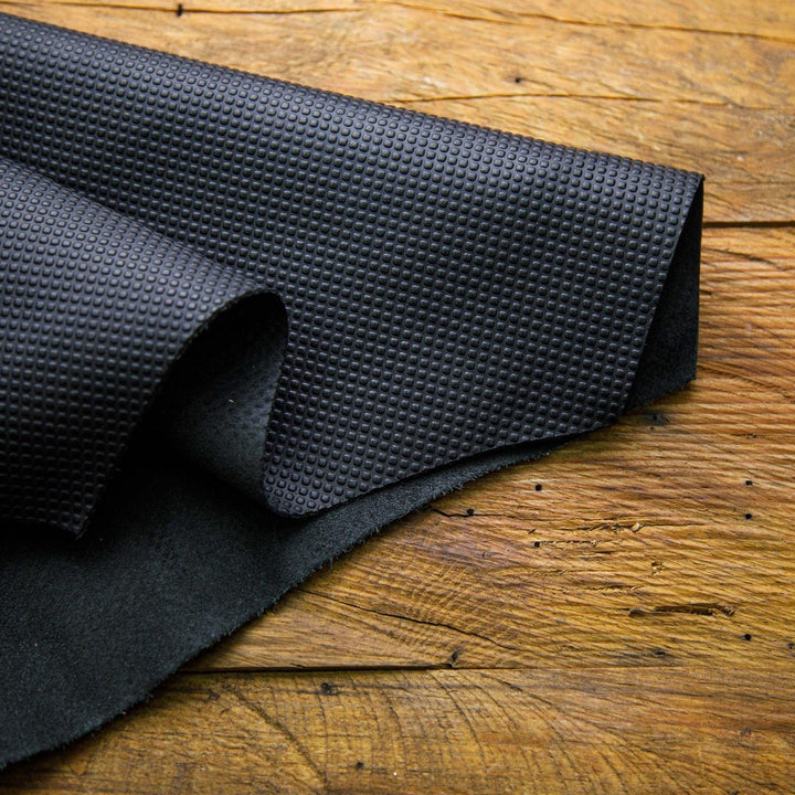 black perforated leather hide