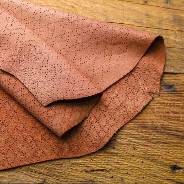 brown leather with flower pattern laser cutting