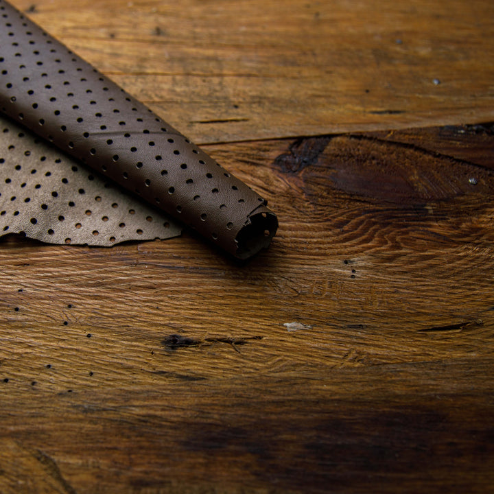 brown perforated rolled leather