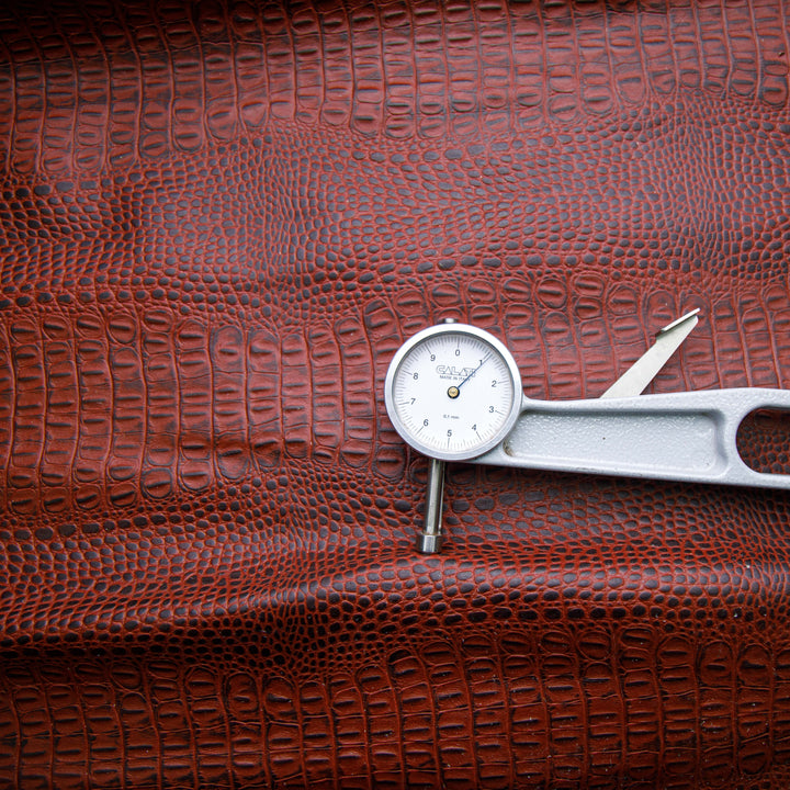 crocodile embossed maroon leather