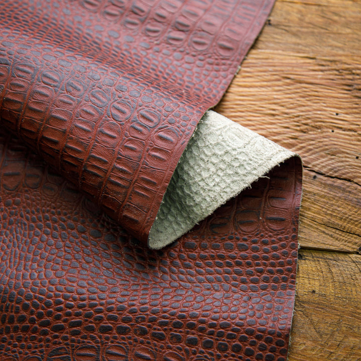 crocodile embossed maroon waxed leather