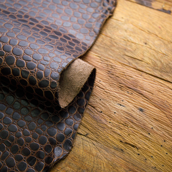 crocodile embossed black waxed leather