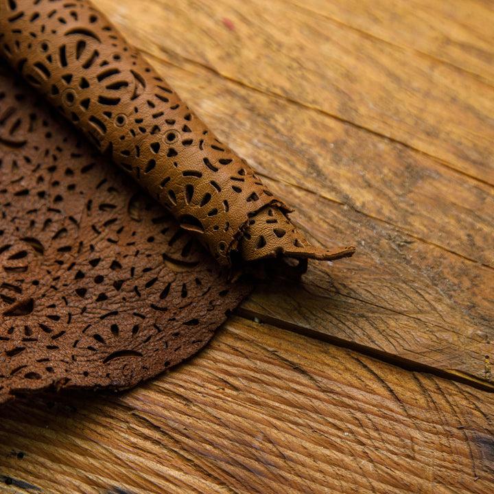 dark brown laser cut leather hide