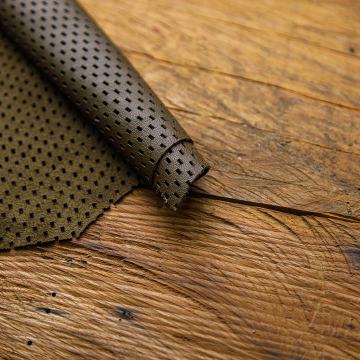 dark brown perforated leather skin