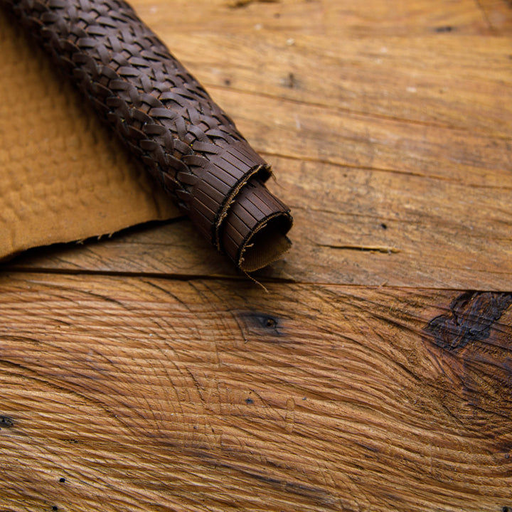 dark brown perforated leather skin