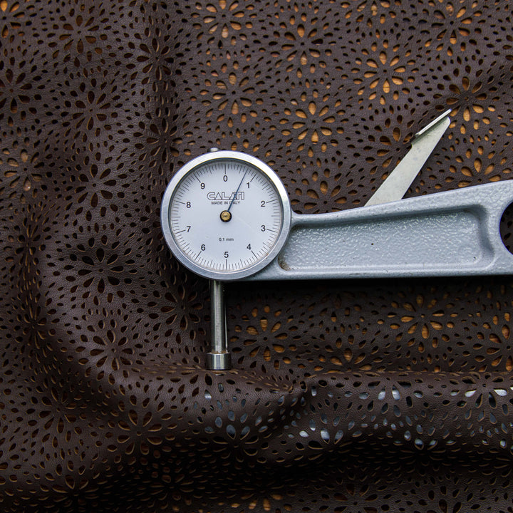 laser cut leather with dark brown color