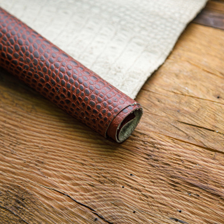 maroon waxed crocodile leather