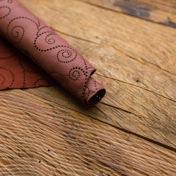 maroon leather laser cut flower pattern