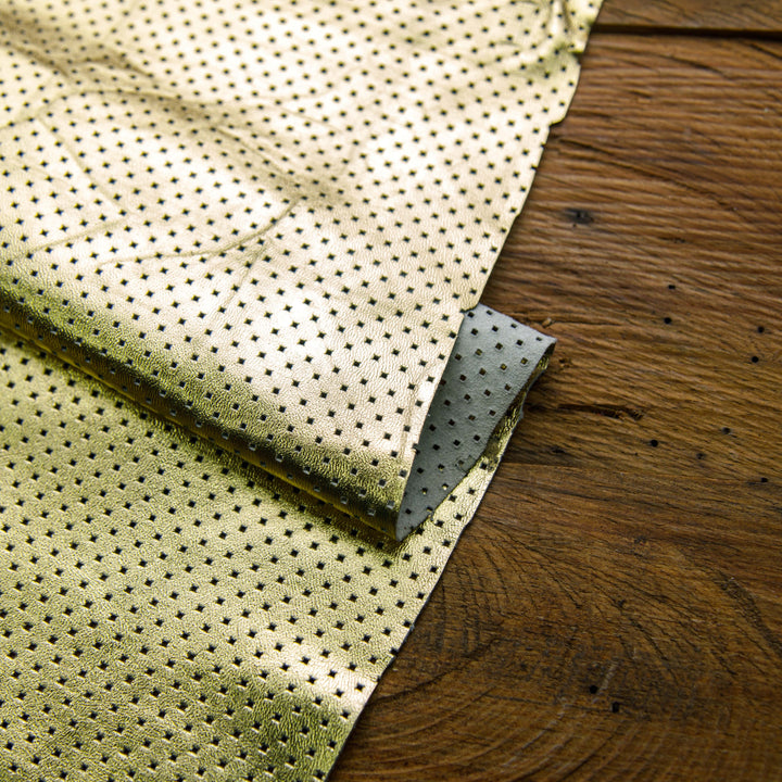 metallic golden perforated leather