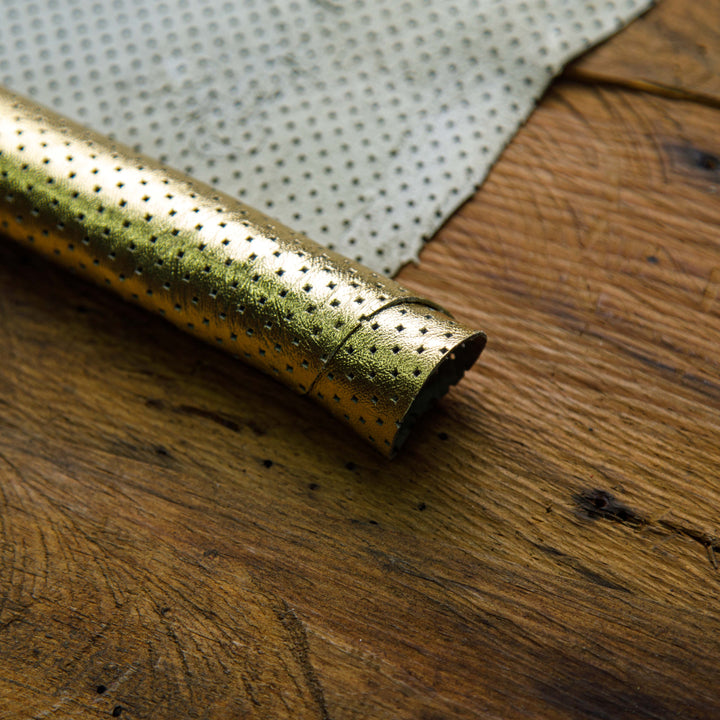 metallic gold perforated leather