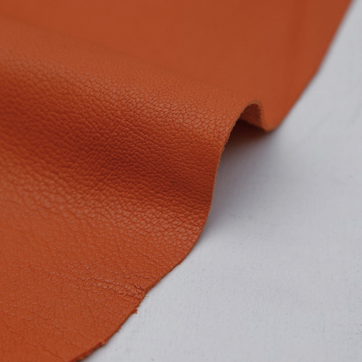 orange matte finished leather hides