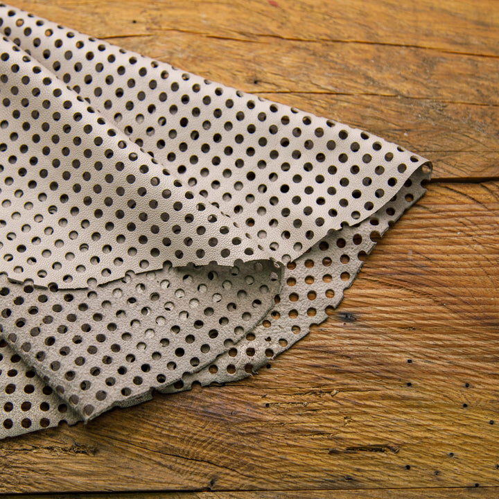 perforated cream color leather