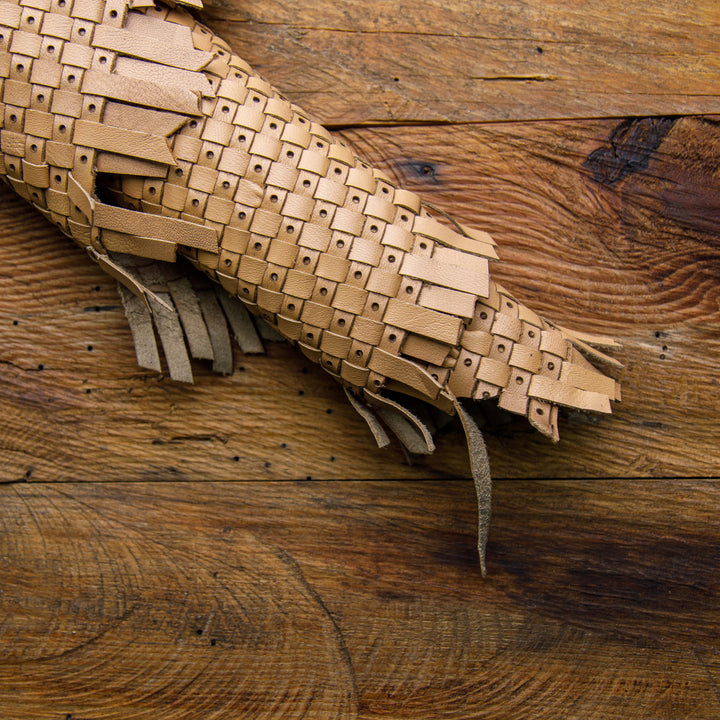 perforated light brown woven leather skin