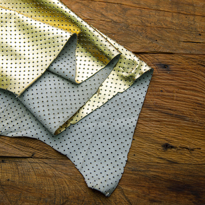 perforated metallic gold leather