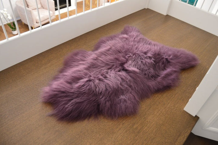 plum sheep rug