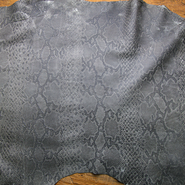 snake embossed black crust leather hide